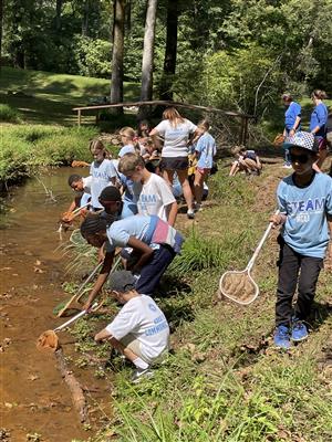 students at stream